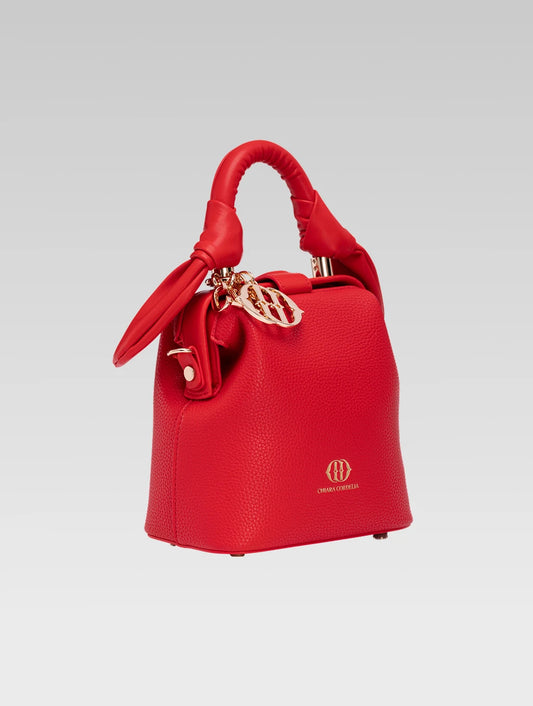 Side view of caledonia frame bag in red color