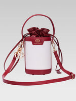 Load image into Gallery viewer, Front view of blaise bucket bag in red color