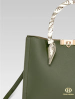 Load image into Gallery viewer, Front cropped view of Alessia Tote bag in British Green color and white clothe beaded to it's handle
