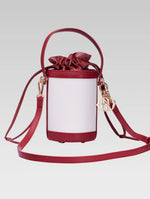 Load image into Gallery viewer, Back view of blaise bucket bag in red color