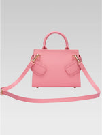 Load image into Gallery viewer, Back view of ophelia envelope bag with shoulder strap in baby pink color