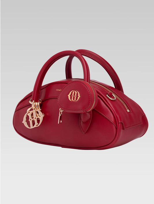 Side view of emberly envelope bag in red color
