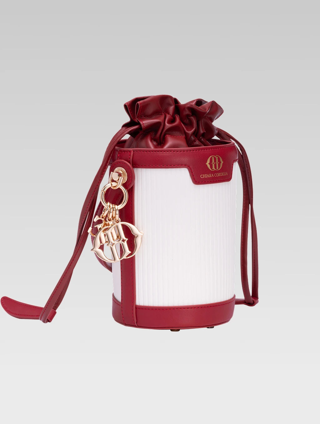 Side view of blaise bucket bag in red color