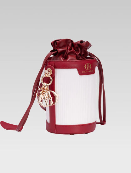 Side view of blaise bucket bag in red color