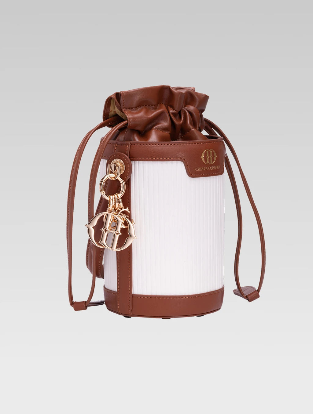 Side view of blaise bucket bag in tan color