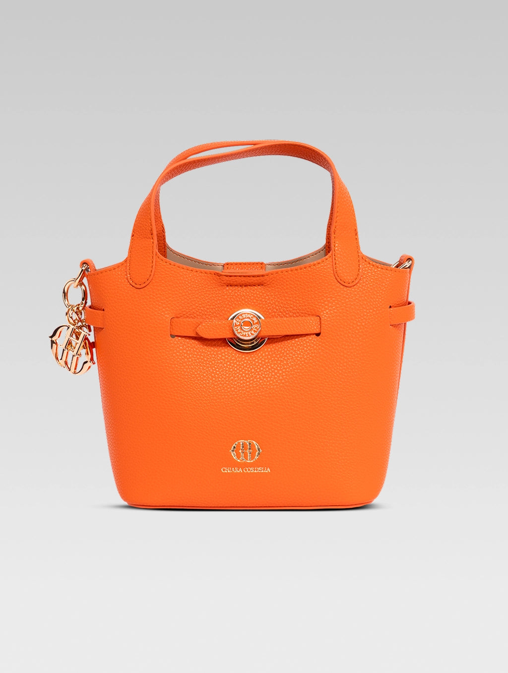 Front view of delphine bucket bag in orange color