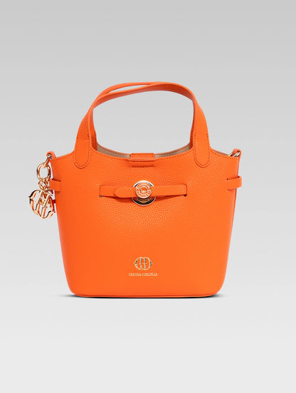 Front view of delphine bucket bag in orange color