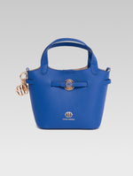 Load image into Gallery viewer, Front view of delphine bucket bag in blue color
