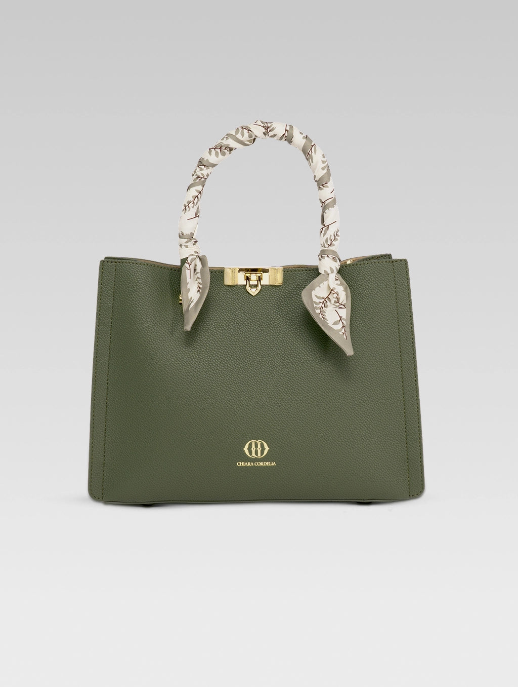 Front view of Alessia Tote bag in British Green color and white clothe beaded to it's handle