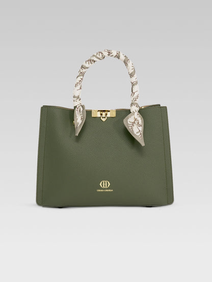 Front view of Alessia Tote bag in British Green color and white clothe beaded to it's handle