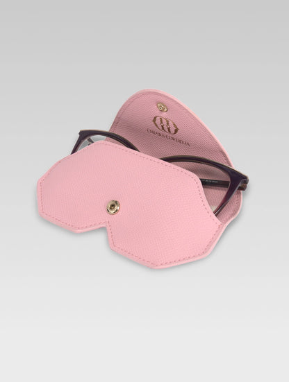 Brown specs frame popping out of Baby pink color Helena sunglass case