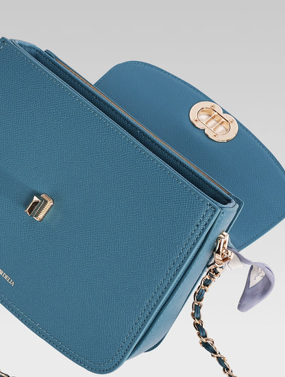 Top open view of jane envelope bag in royal teal color
