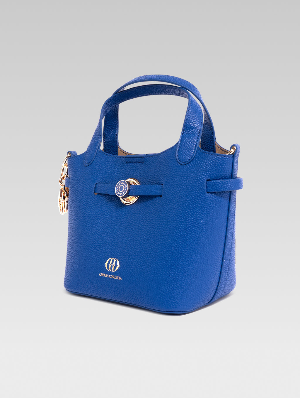Right side view of delphine bucket bag in blue color