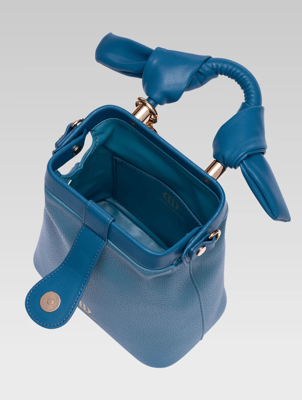 Top view of caledonia frame bag in teal color