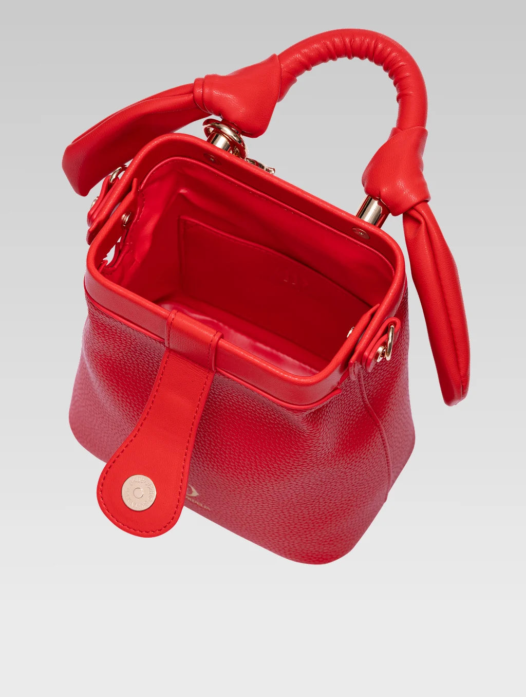 Top view of caledonia frame bag in red color