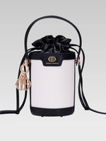 Load image into Gallery viewer, Front view of blaise bucket bag in black color
