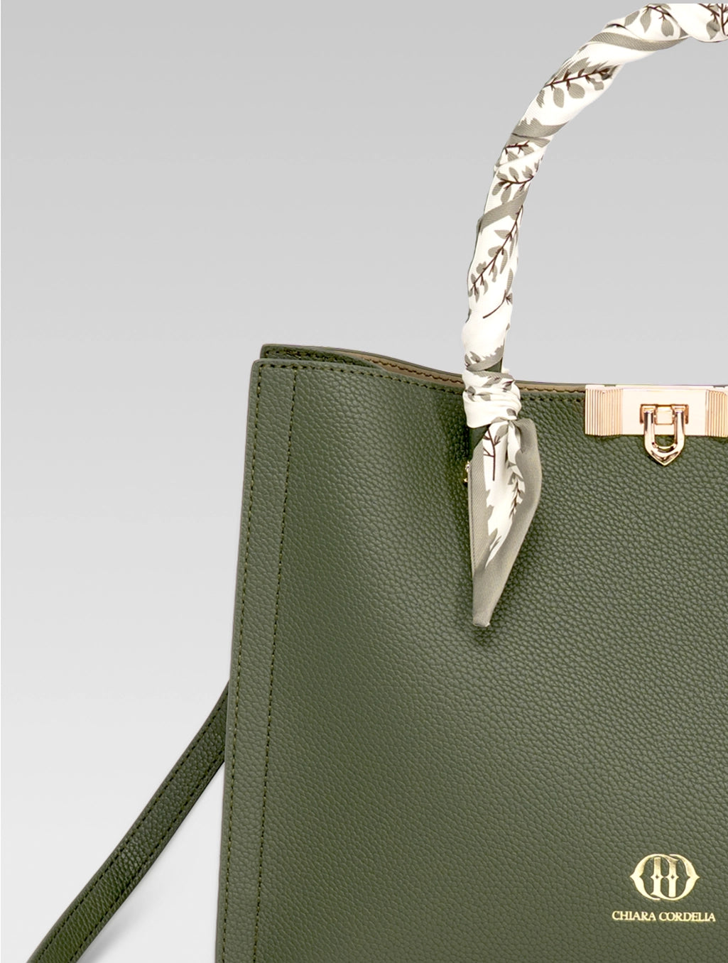 Front cropped view of Alessia Tote bag in British Green color and white clothe beaded to it's handle