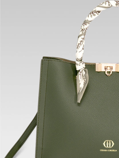 Front cropped view of Alessia Tote bag in British Green color and white clothe beaded to it's handle