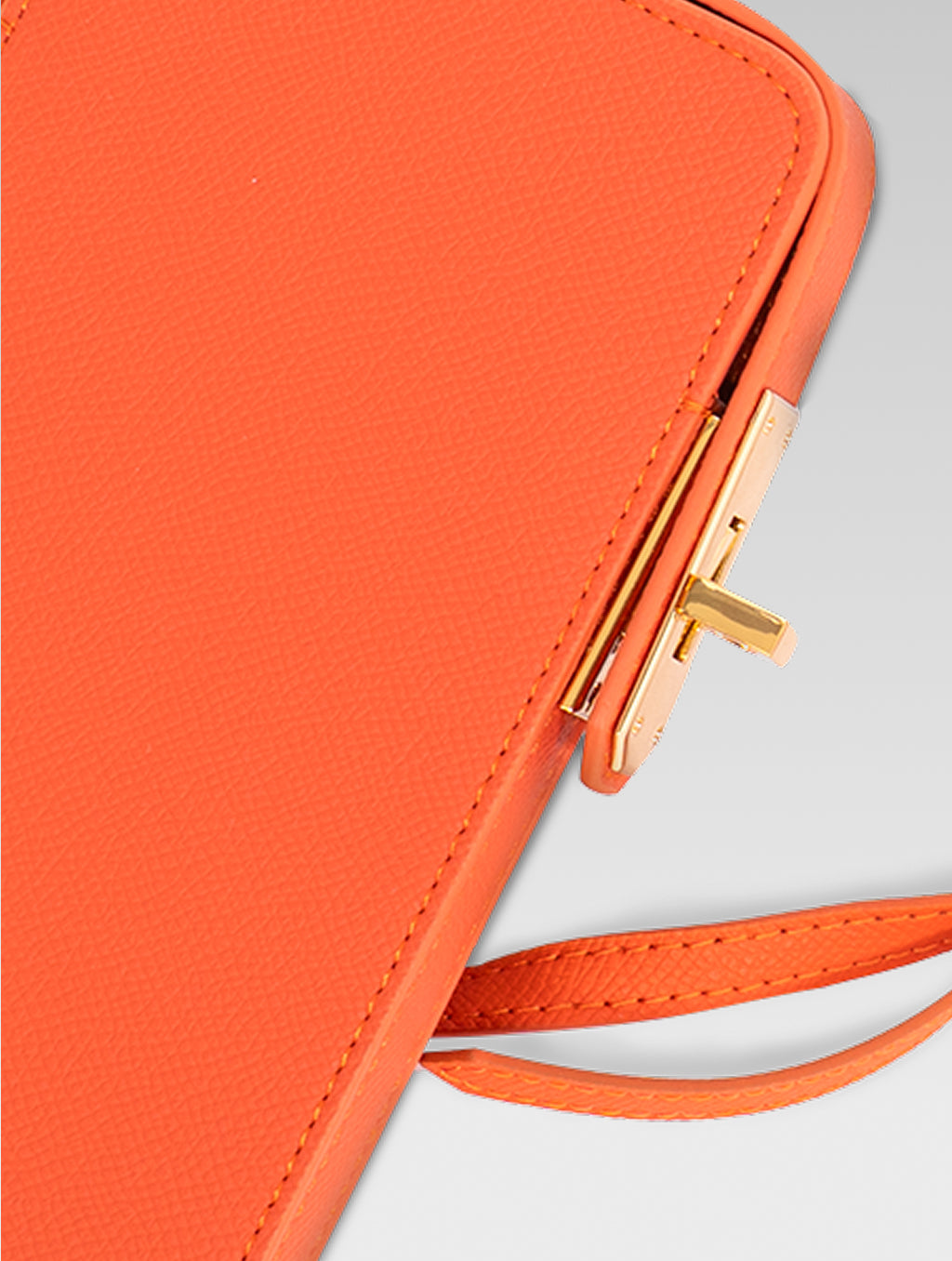 Sixtine - side lock of orange color phone bag with lock