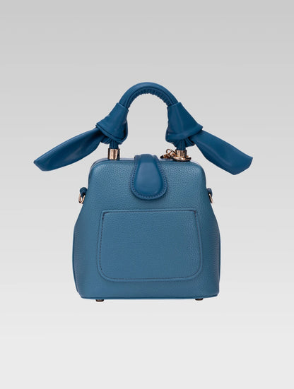 Back view of caledonia frame bag in teal color