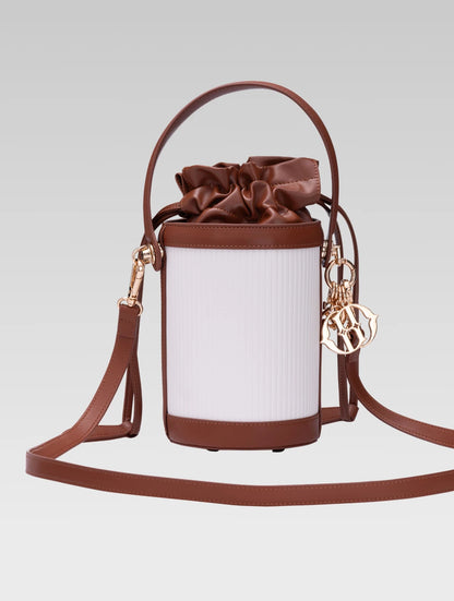 Back view of blaise bucket bag in tan color