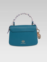 Load image into Gallery viewer, Back view of jane envelope bag in royal teal color
