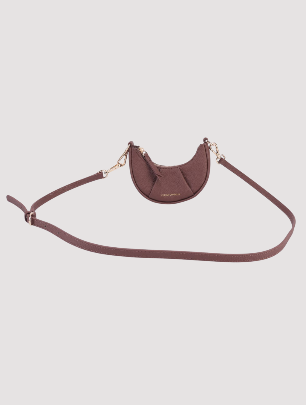 Kensington Chesterfield mini crescent leather bag in warm tan shade