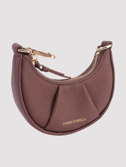 Kensington Chesterfield mini crescent leather bag in warm tan shade