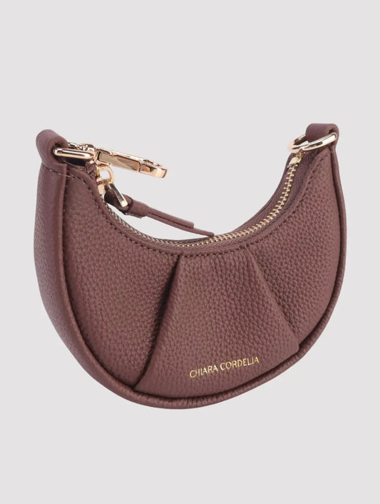 Kensington Chesterfield mini crescent leather bag in warm tan shade