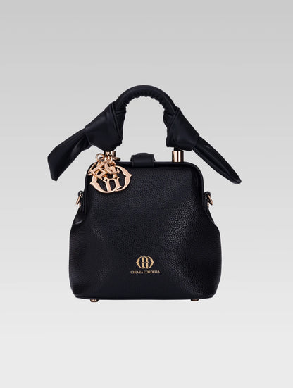 Front view of caledonia frame bag in black color