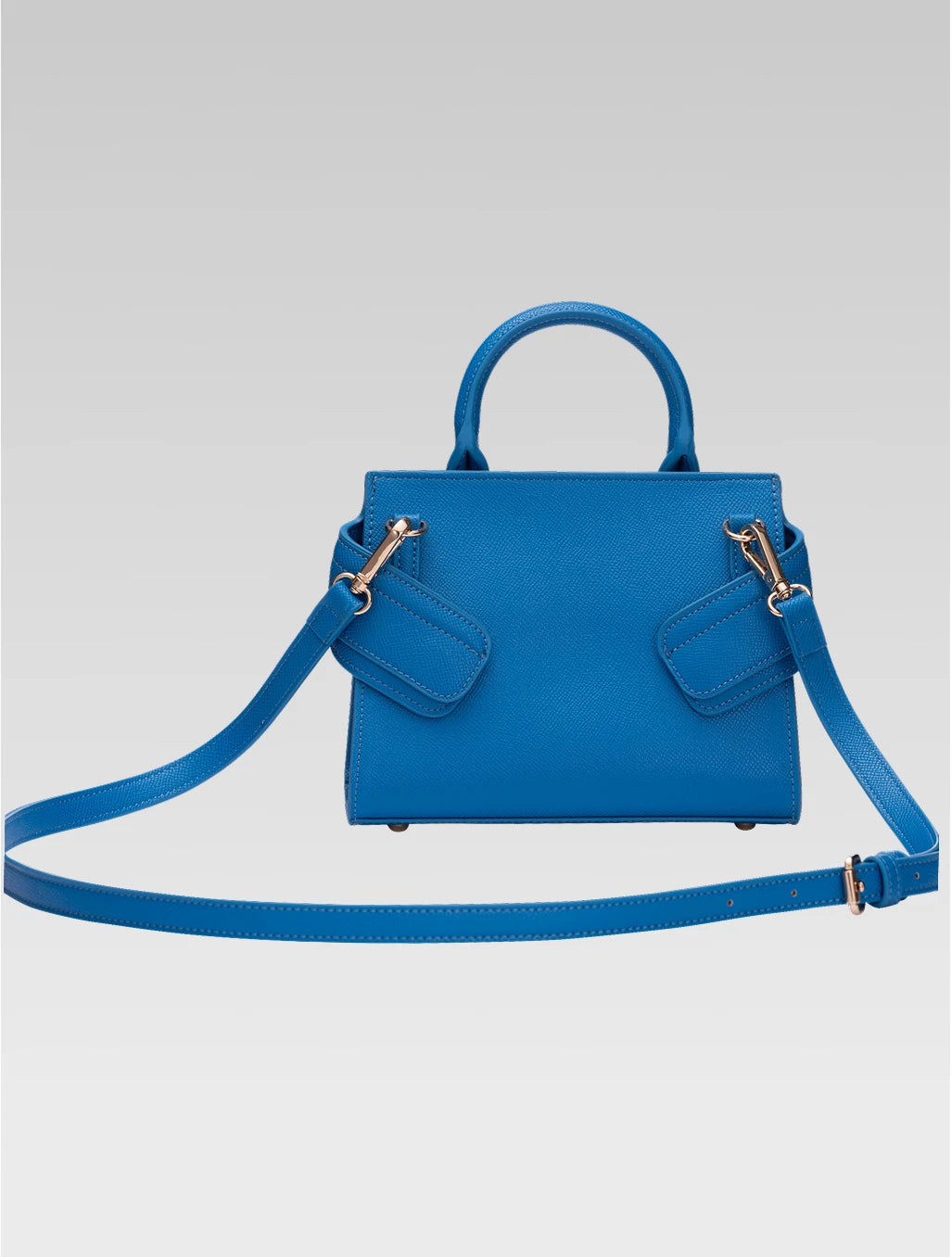 Back view of ophelia envelope bag with shoulder strap in blue color