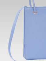 Load image into Gallery viewer, Back view of genevieve bucket bag in baby blue color
