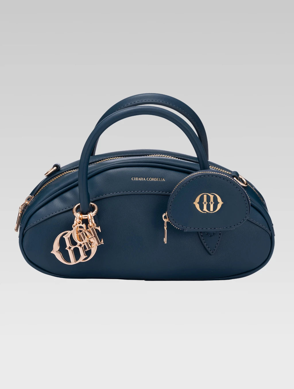 Front view of emberly envelope bag in royal teal color