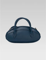 Load image into Gallery viewer, Back view of emberly envelope bag in royal teal color
