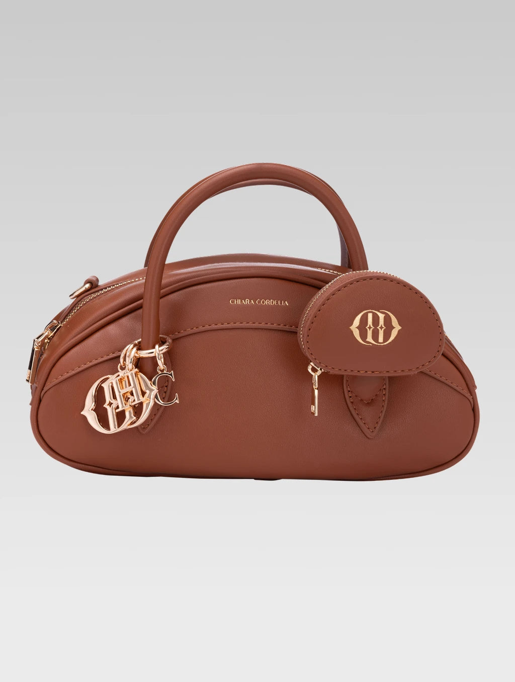 Front view of emberly envelope bag in tan color