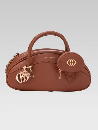 Front view of emberly envelope bag in tan color