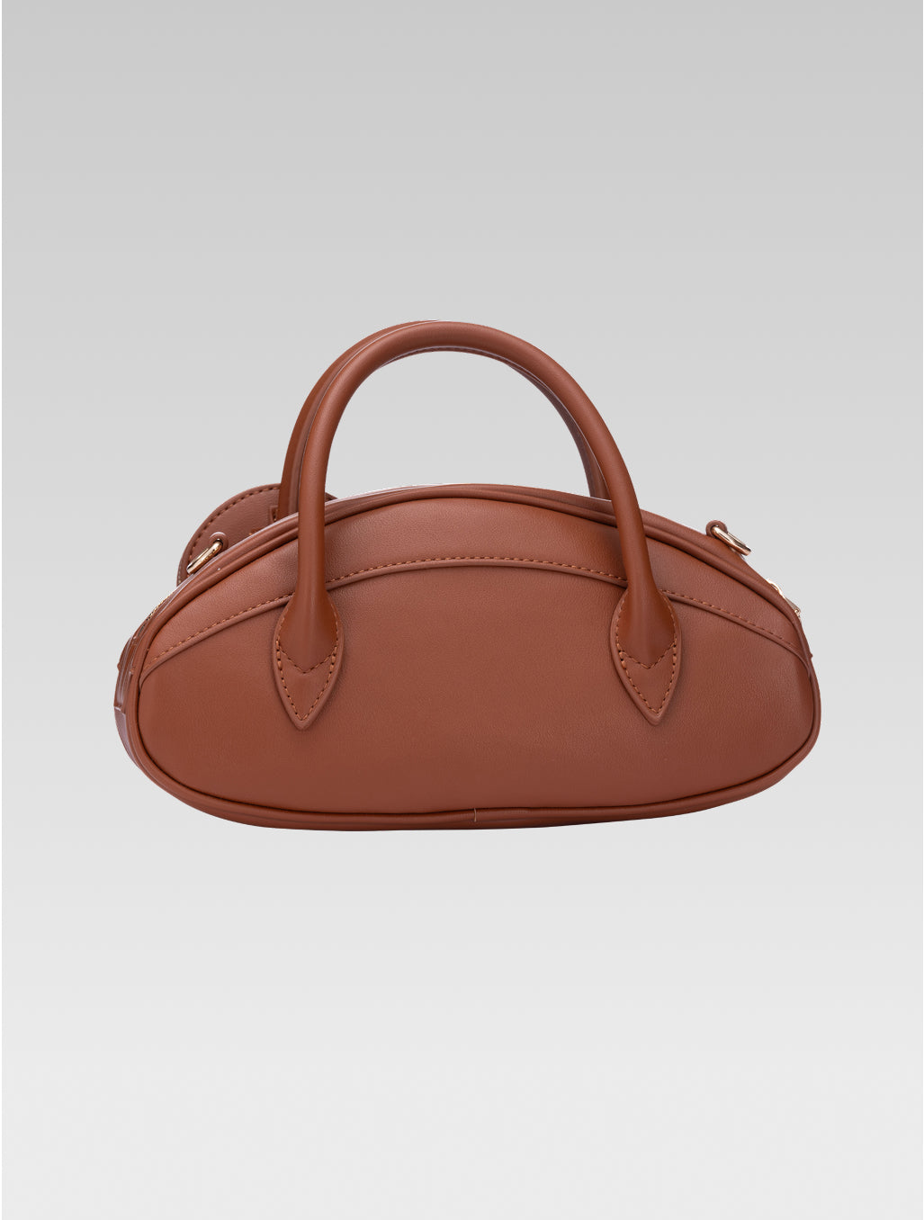 Back view of emberly envelope bag in tan color