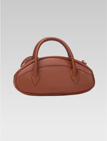 Load image into Gallery viewer, Back view of emberly envelope bag in tan color
