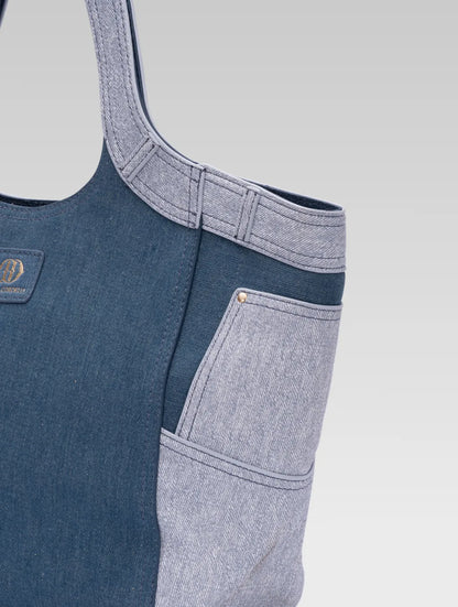 Cropped side view of Marlene dark blue demin tote bag