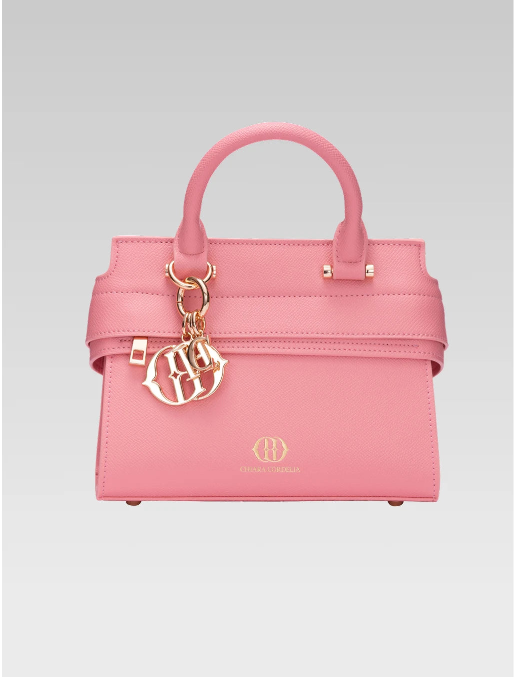 Front view of ophelia envelope bag handle in baby pink color