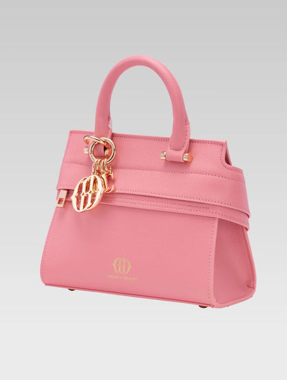 Side view of ophelia envelope bag handle in baby pink color