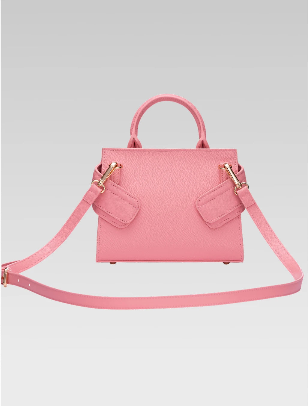 Back view of ophelia envelope bag with shoulder strap in baby pink color