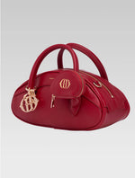 Load image into Gallery viewer, Side view of emberly envelope bag in red color
