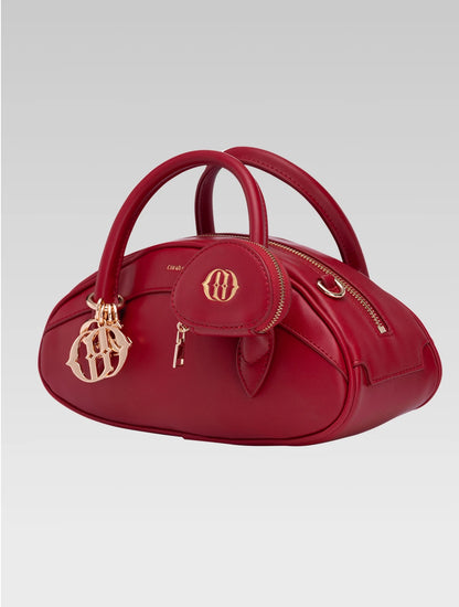Side view of emberly envelope bag in red color