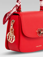 Load image into Gallery viewer, Side view of jane envelope bag handle in red color
